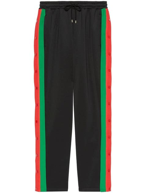 gold gucci track pants|Gucci side stripe track pants.